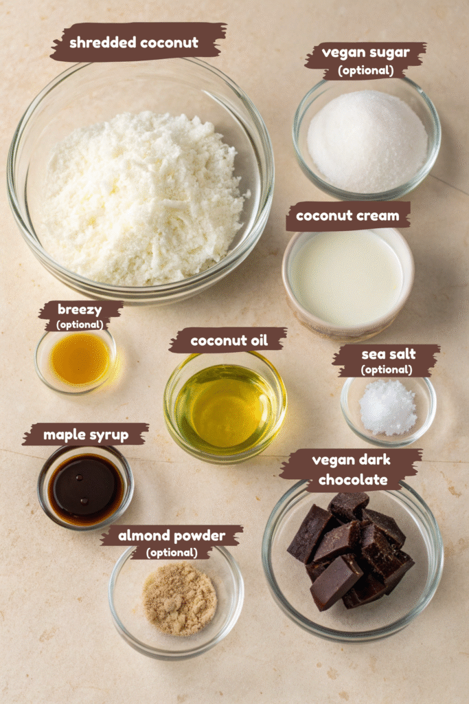 Ingredients for vegan chocolate coconut bars arranged in glass bowls.