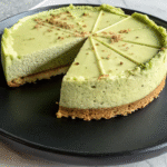 Delicious matcha cheesecake with a golden crust, sliced for serving – Matcha Cheesecake Recipe.