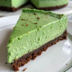 Green Velvet Cheesecake Recipe 26 Slice of no bake green velvet cheesecake on a plate