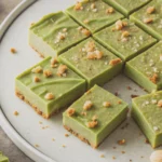 Raw Vegan Matcha Cheesecake Recipe 26 Raw vegan matcha cheesecake bars topped with crushed nuts