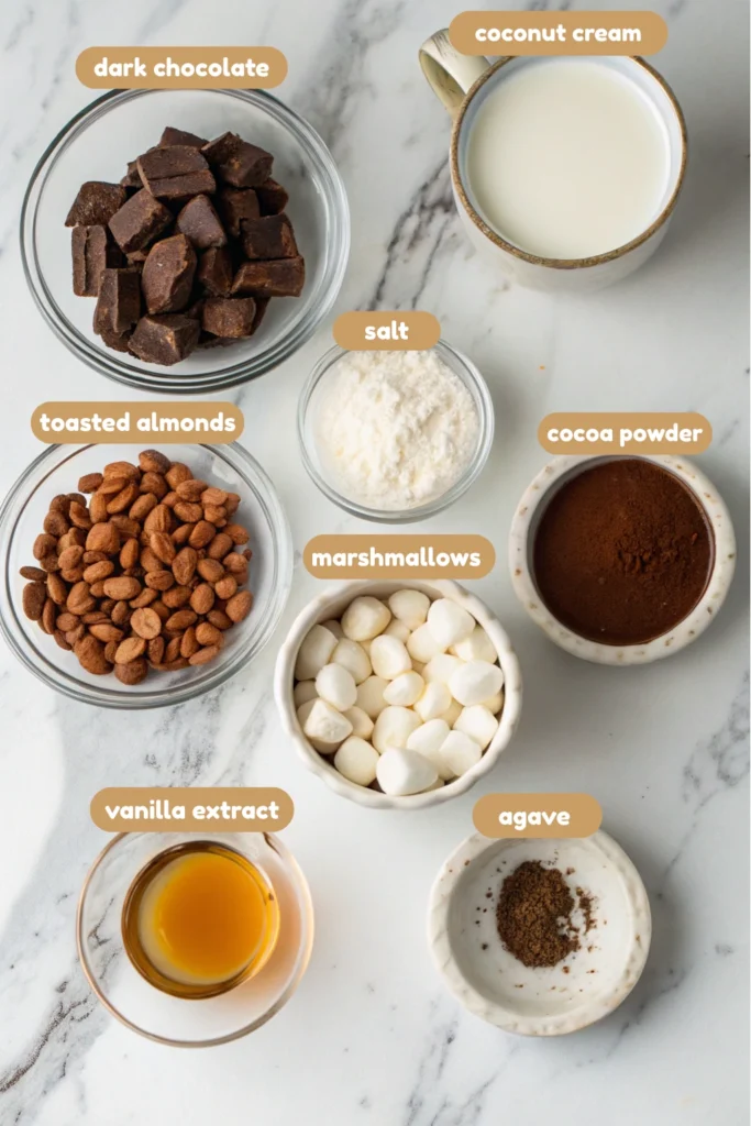 Rocky Road Vegan Ice Cream 15 Flat lay of vegan rocky road ingredients including coconut cream, dark chocolate, marshmallows, and almonds